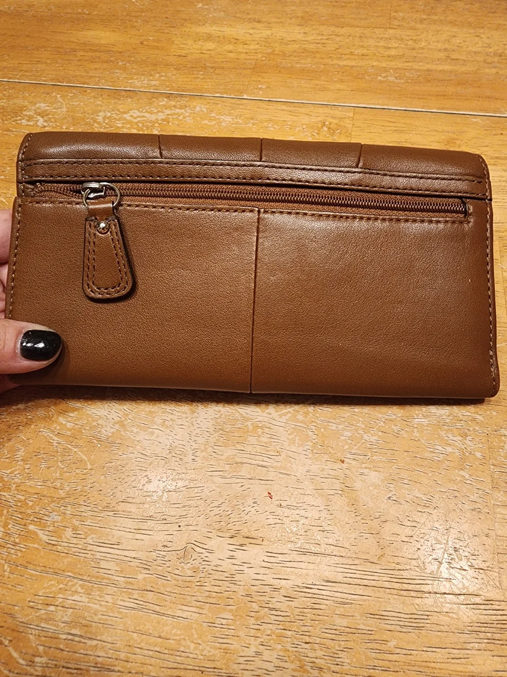 vintage Coach Soho Buckle Wallet crafted in brown leather prominent front Buckle